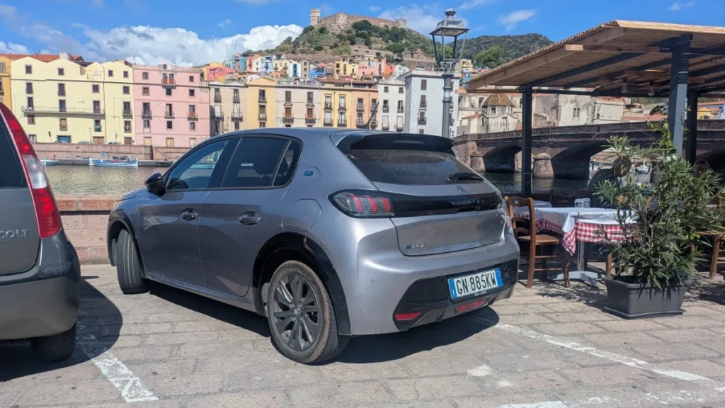 Renting the Peugeot E-208 in Sardinia: A European EV Road Trip and Reality Check