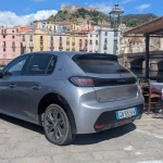 Renting the Peugeot E-208 in Sardinia: A European EV Road Trip and Reality Check